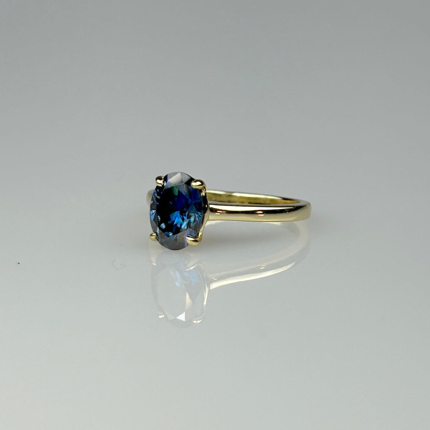 Blue Oval Solitaire Ring