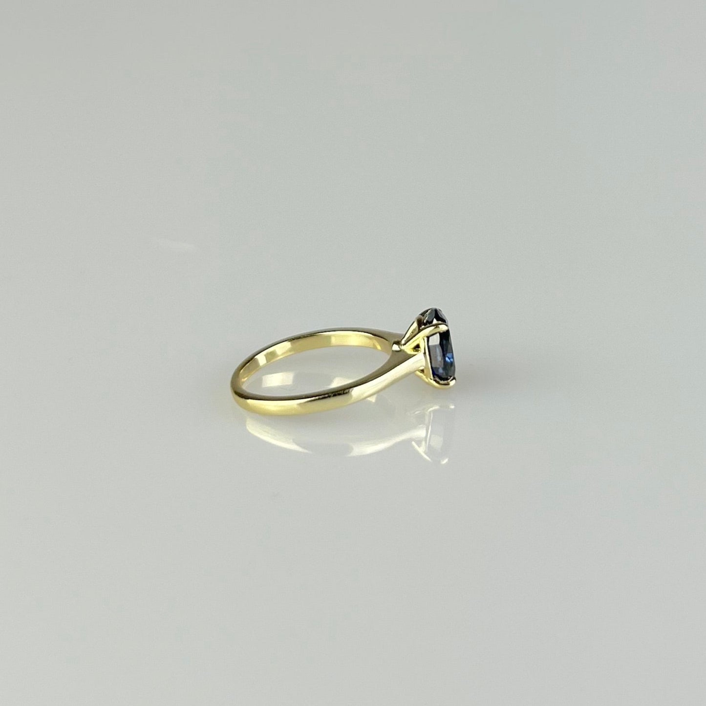 Blue Oval Solitaire Ring