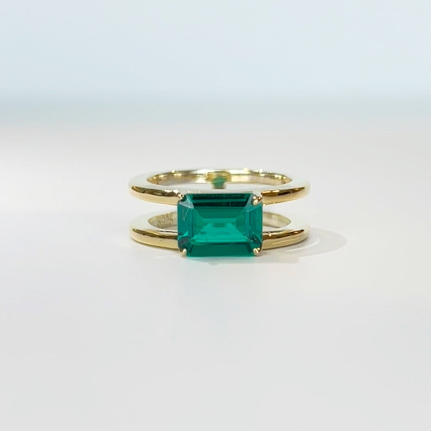 East West Emerald Gemstone with Double Open Band
