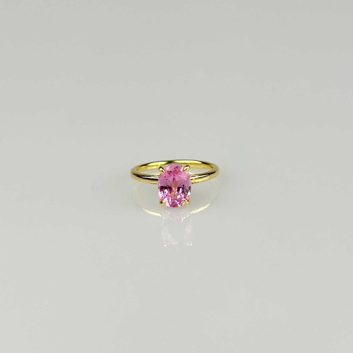 Oval Pink Sapphire with Hidden Halo