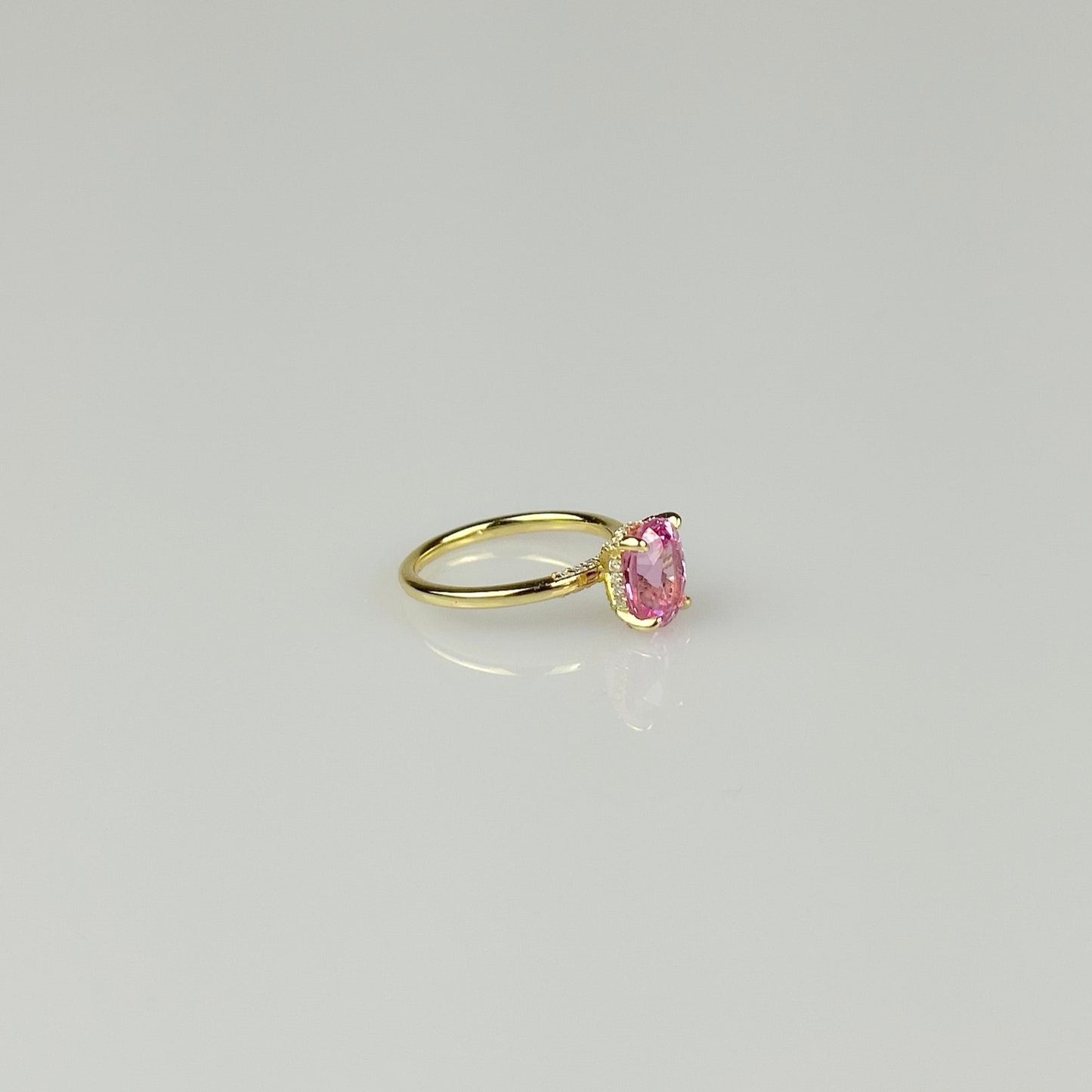 Oval Pink Sapphire with Hidden Halo