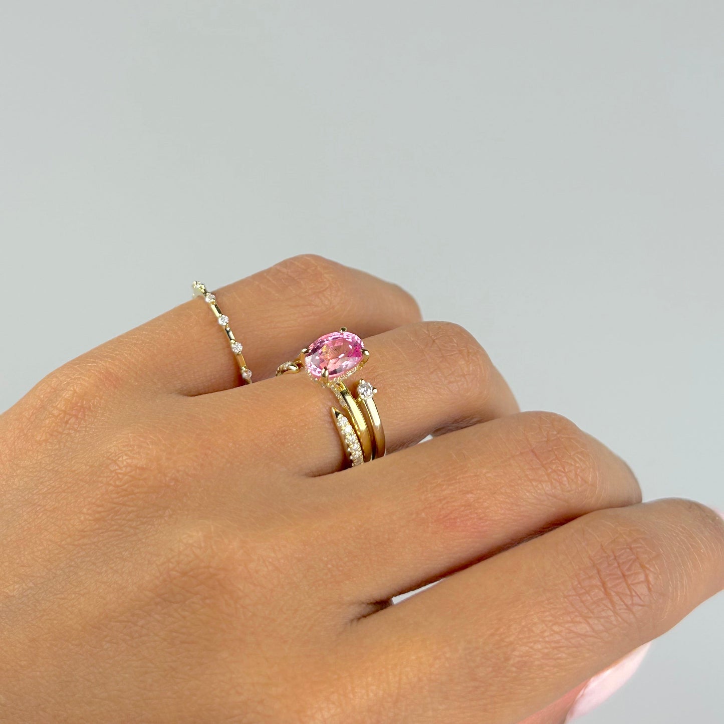 Oval Pink Sapphire with Hidden Halo