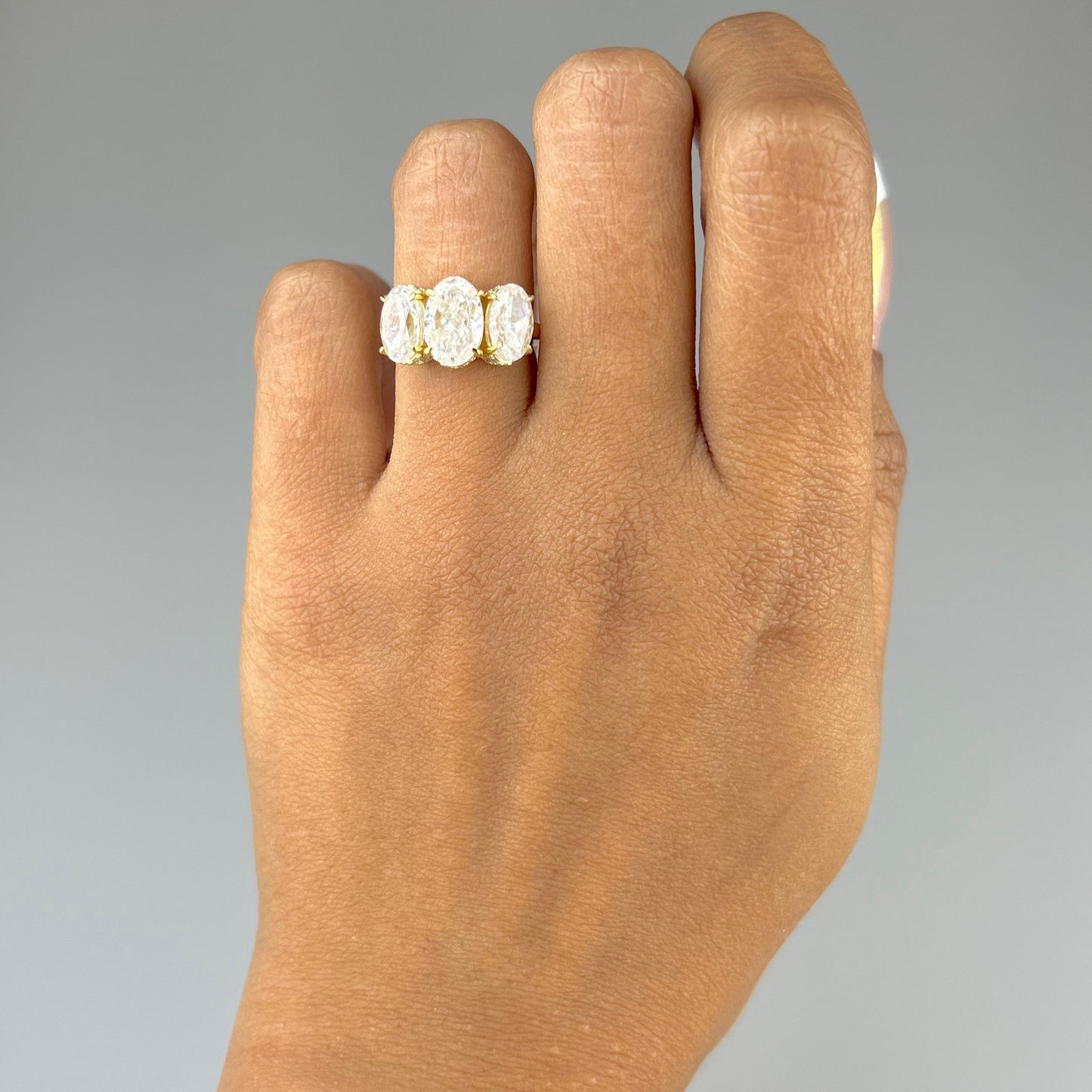 Three Stone Oval Ring with Hidden Halos