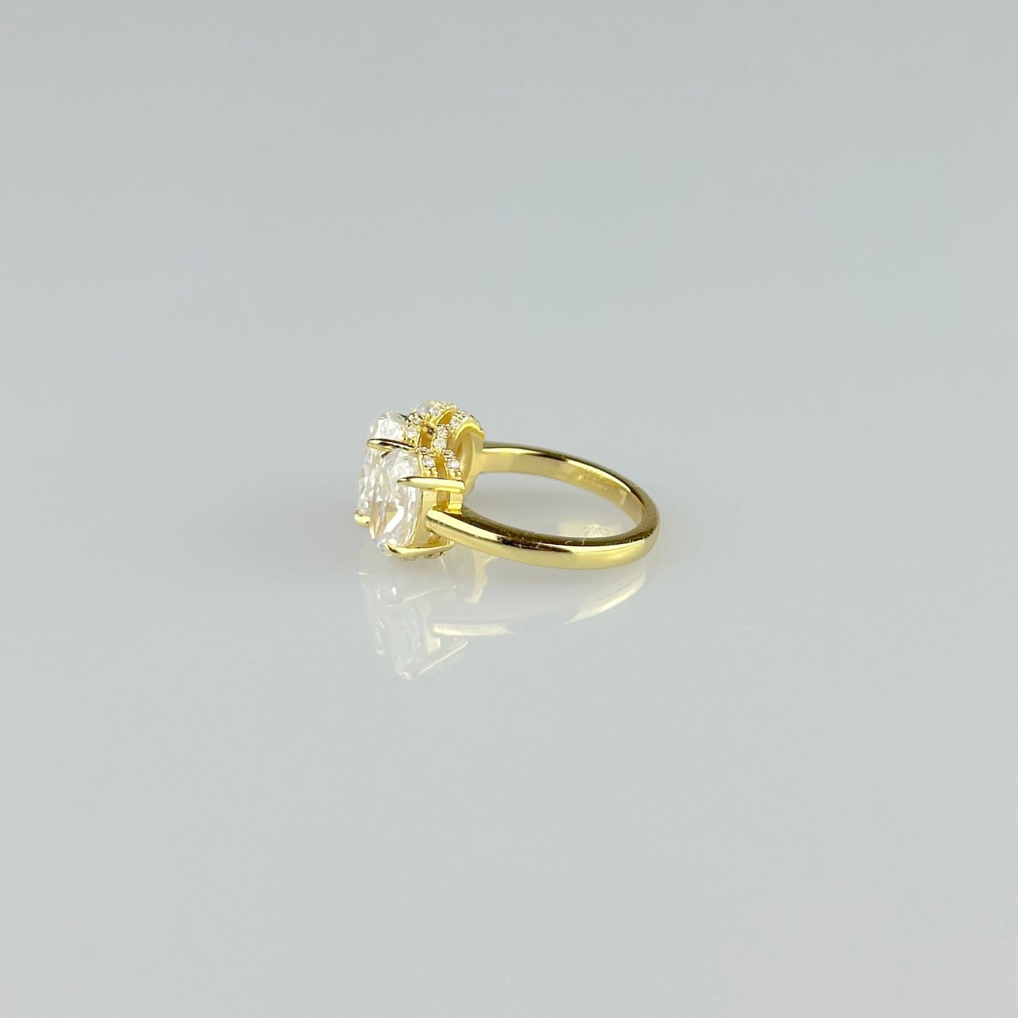 Three Stone Oval Ring with Hidden Halos
